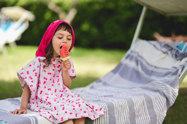 istock little girl enjoying summer vacations. 1471245512