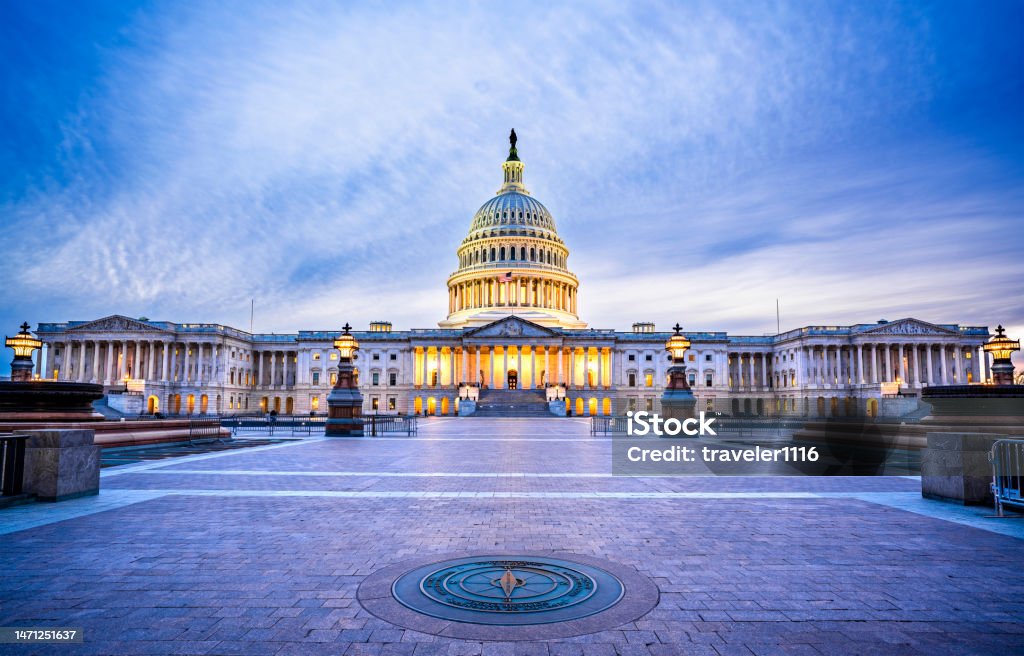 The Capitol Building in Washington, D.C., USA The Capitol Building in Washington, D.C., USA lit up in the early evening. Washington DC Stock Photo