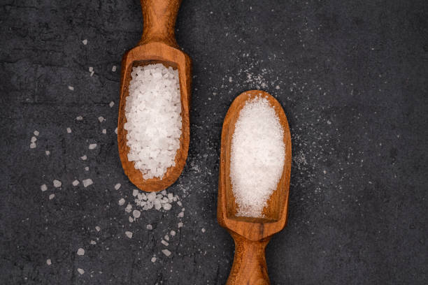 istock Rock salt on black background 1471262228