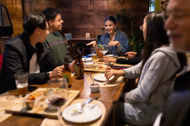 istock Friends enjoying dinner and anecdotes 1471263633