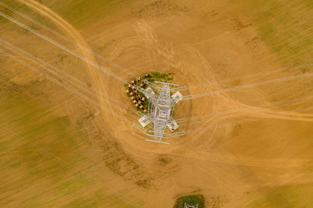 istock Drone top down view of high voltage electrical line and steel electrical pole 1471268417