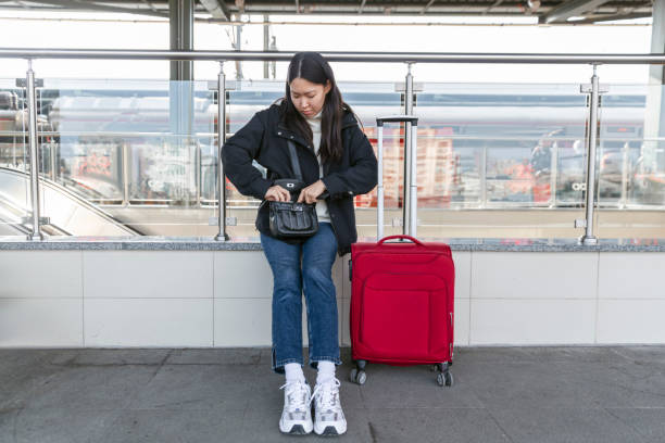 istock Woman waiting for train at the station 1471278370