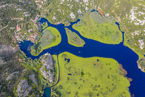 Aerial view of Karuc village on Skadar Lake in Montenegro. Lake Skadar is the largest lake in Southern Europe