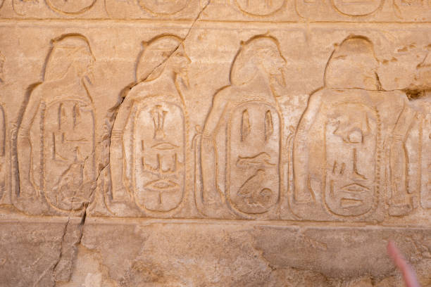 istock Egyptian Hieroglyphics written on a wall 1471282764