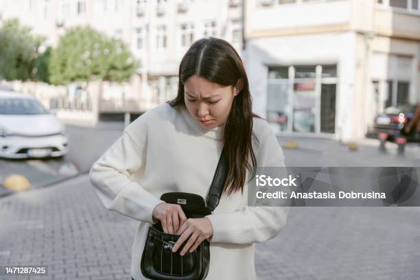 Asian Tourist Woman Discovering Missing Wallet Stock Photo - Download Image Now - Searching, Wallet, Reminder