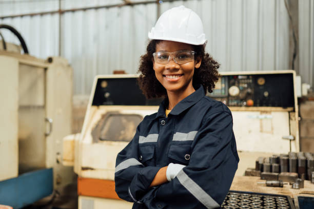 istock Smiling portrait of confident engineer worker at factory 1471288105
