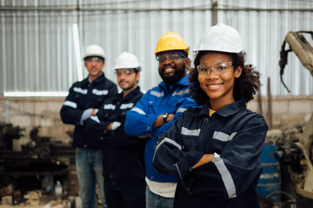 istock Group of confident worker team at factory 1471288341