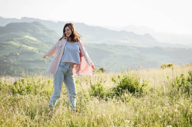 istock female enjoying a mountain trip. 1471292159