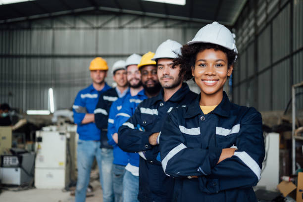 istock Group of confident worker team at factory 1471292344
