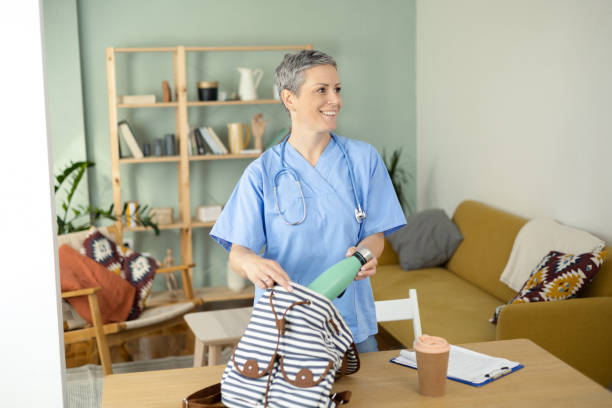 istock Portrait of a female doctor packing her backpack for work 1471298358