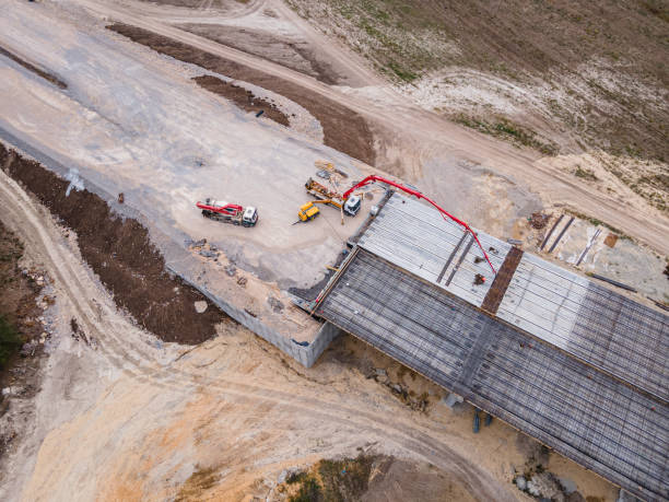 istock Building highways. Aerial view of road construction site. 1471298541