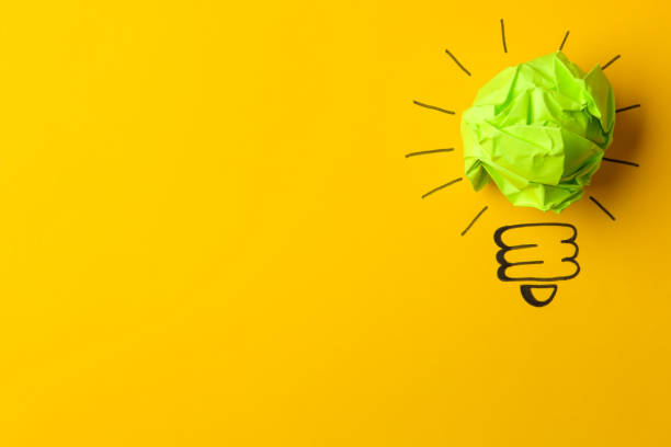 istock Concept creative idea. concept of creative idea. Crumpled paper balls and painted light bulb on bright background. metaphor, inspiration. 1471298873