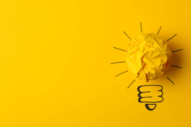 istock Concept creative idea. concept of creative idea. Crumpled paper balls and painted light bulb on bright background. metaphor, inspiration. 1471298937