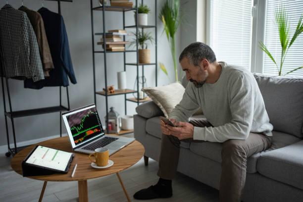 istock Stock trading. Trader studying stock markets. 1471299081