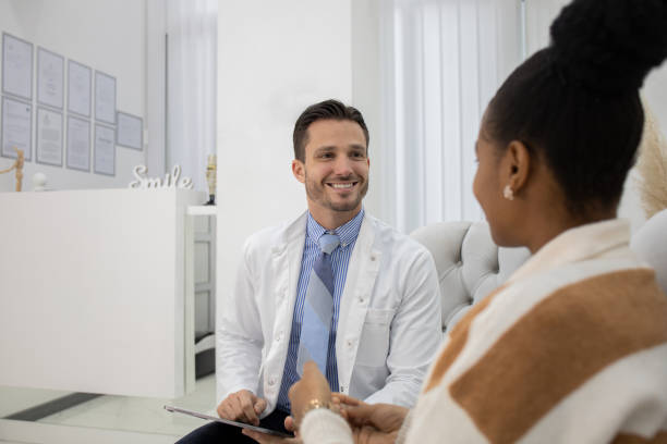 istock Young woman at the dentist's office 1471302942
