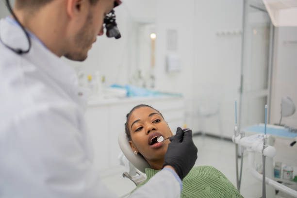 istock Woman at the dentist 1471302957