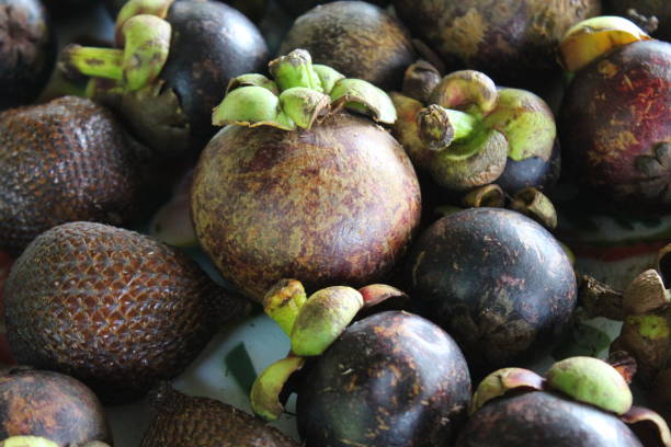 istock The mangosteen fruit on the table 1471308237