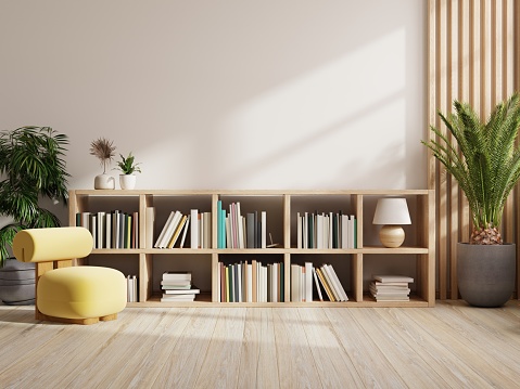 Library interior with yellow armchair on white wall background.3d rendering