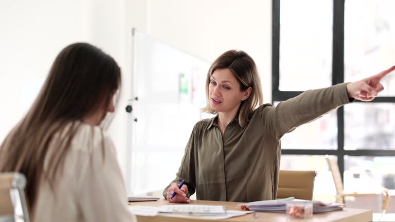 Angry boss fires and yells at employee for bad work