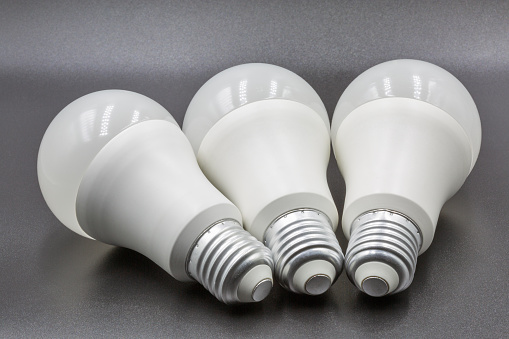 LED new technology light bulbs closeup on black. Energy super saving electric lamp is good for environment.