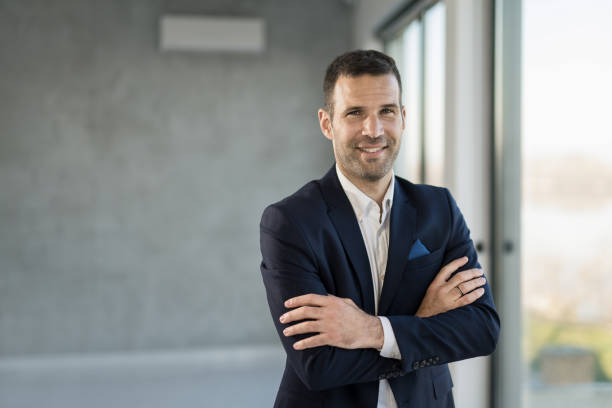 istock Happy businessman looking at camera. 1471316717