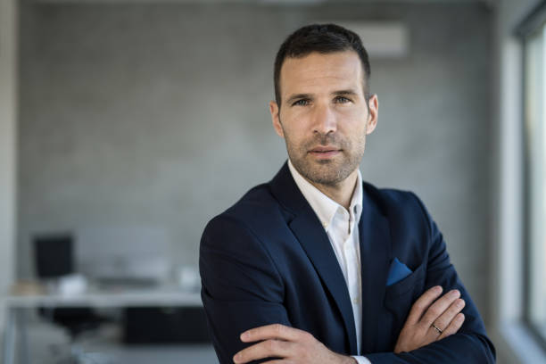 istock Serious businessman looking at camera. 1471317592