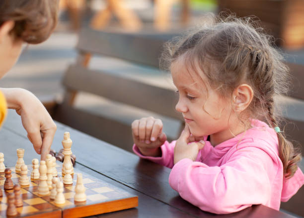 istock children are learning to play chess 1471317941