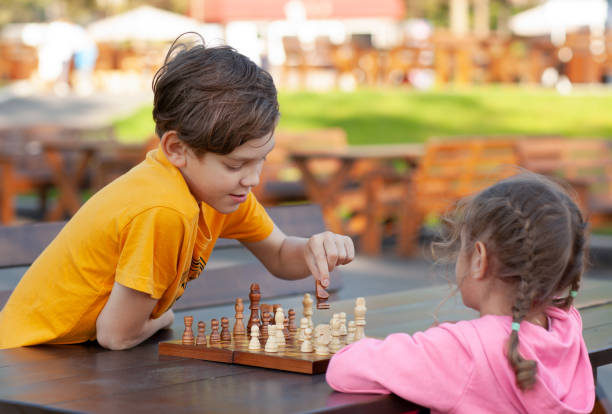 10,400+ Kids Playing Chess Stock Photos, Pictures & Royalty-Free Images -  iStock