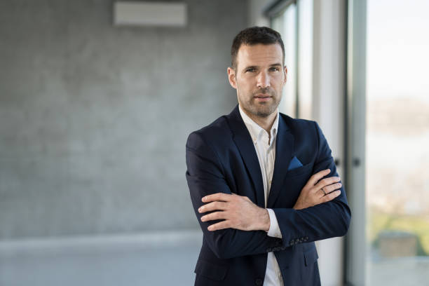 istock Serious businessman looking at camera. 1471318076