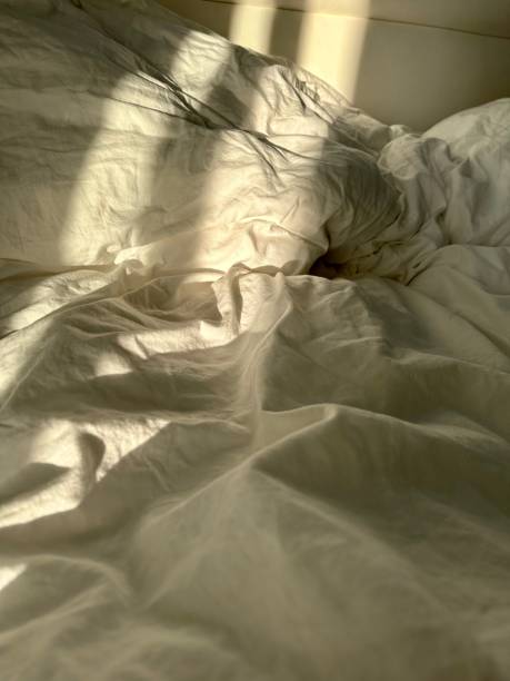istock Crumpled bed in the morning 1471344145
