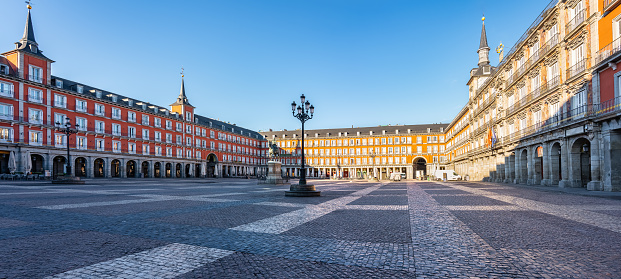 Panoramic view of the Plaza Mayor of Madrid with its buildings with balconies and windows typical of the city
