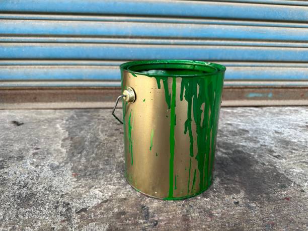 old paint cans stock photo