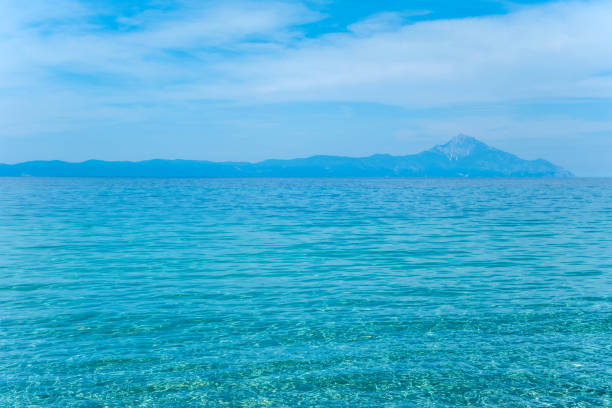 water of Aegean Sea against the background of Mount Athos
