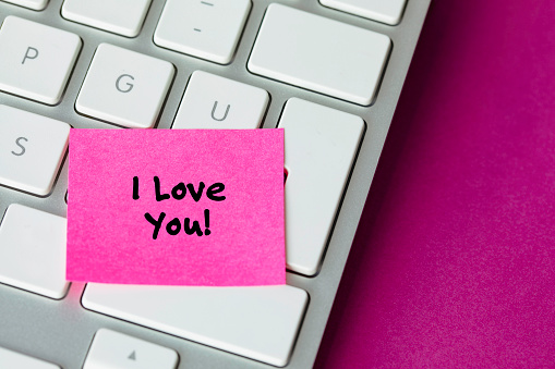 I Love You note on keyboard.