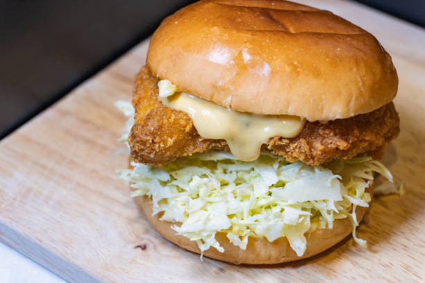 istock A hamburger with a fried chicken meat in between. 1471387405
