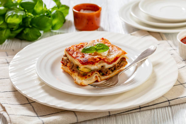istock portion of Lasagna on white plate, top view 1471399237