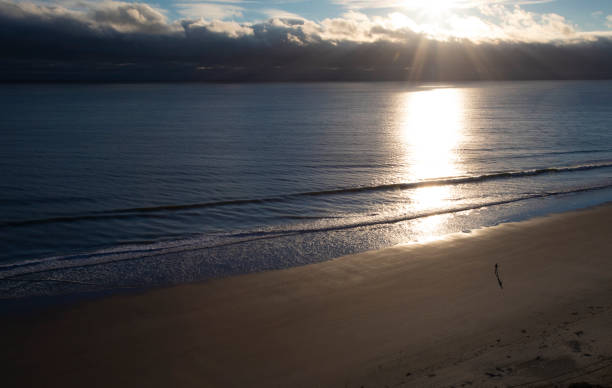 istock Solitary walker on the sand at Myrtle Beach 1471400629