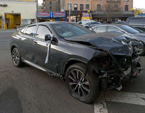 Wrecked vehicle left abandoned Bronx NY stock photo