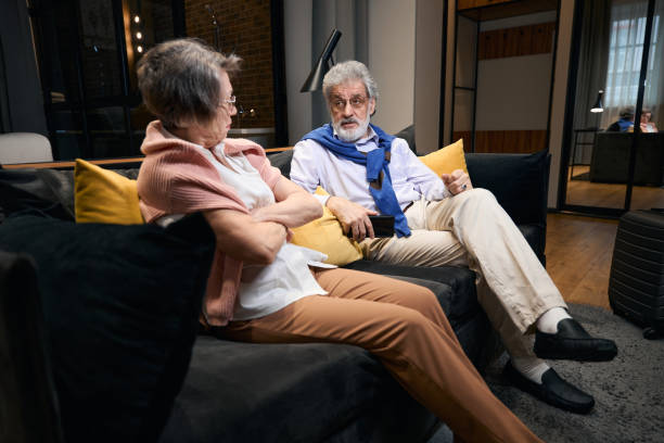 istock Elderly man and woman sort things out 1471406279