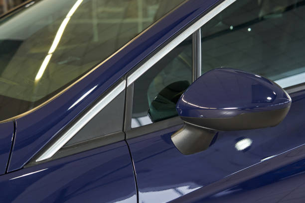 istock blue car side exterior rear view mirror 1471407262