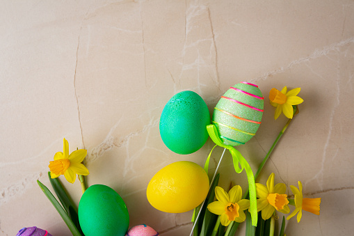 Easter holiday color eggs decor and flowers copy space