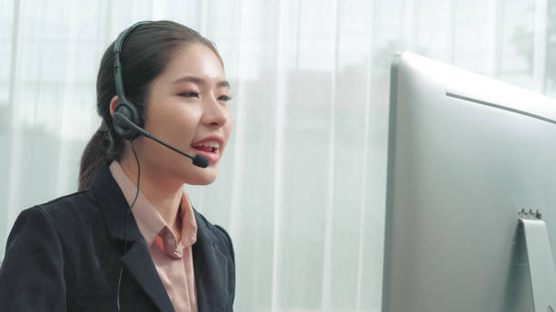 istock Enthusiastic female operator provide helpful customer service to customer. 1471410158