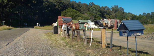 istock Mailbox, retro style, on country road. Rusty letterbox. Creative mailboxes in Australia. 1471410262