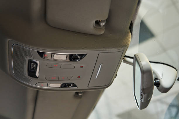 istock car interior lighting, buttons on the ceiling, light bulbs, eyeglass case, rear-view mirror, interior volume sensors. ceiling lining. 1471412410