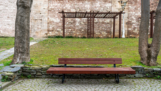 Empty bench in the city park