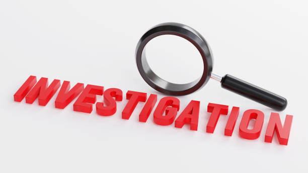 istock Magnifying glass with investigation text 3d 1471412703