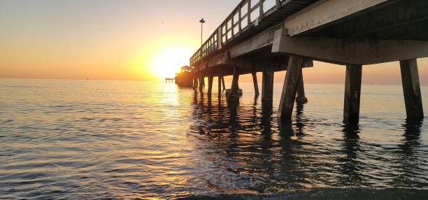 istock Sunrise and the pier 1471412733