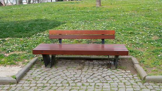 Empty bench in the city park