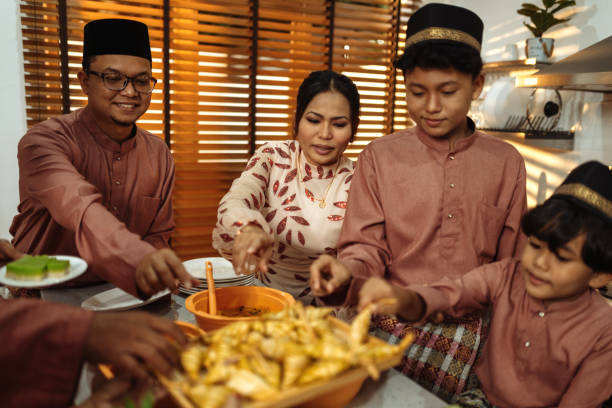 istock Muslim family celebrating Eid al-Fitr 1471413189