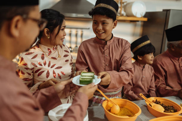 istock Muslim family celebrating Eid al-Fitr 1471414362